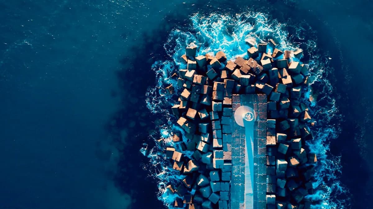 aerial view of rock formation beside sea