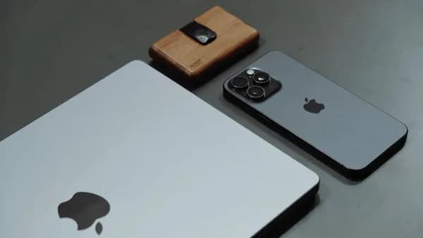 a couple of cell phones sitting on top of a table