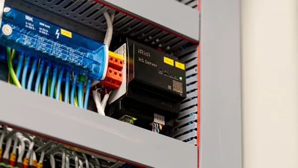 Electrical panel with wires and components.