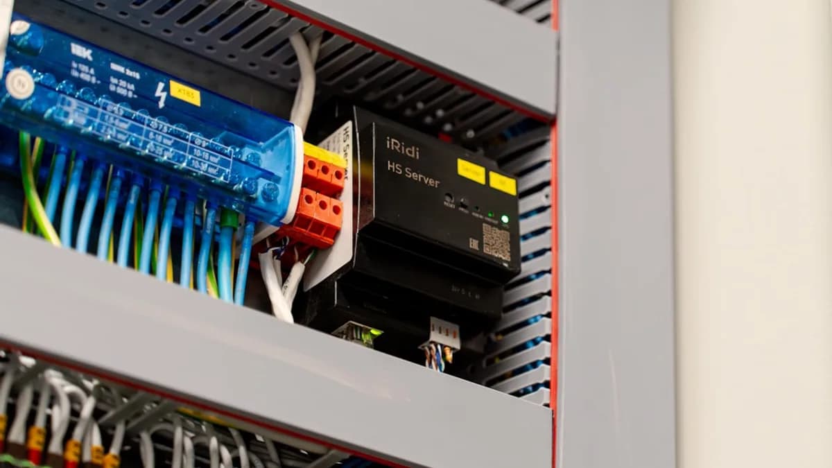 Electrical panel with wires and components.