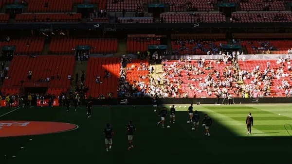 People in a stadium watching a sports game