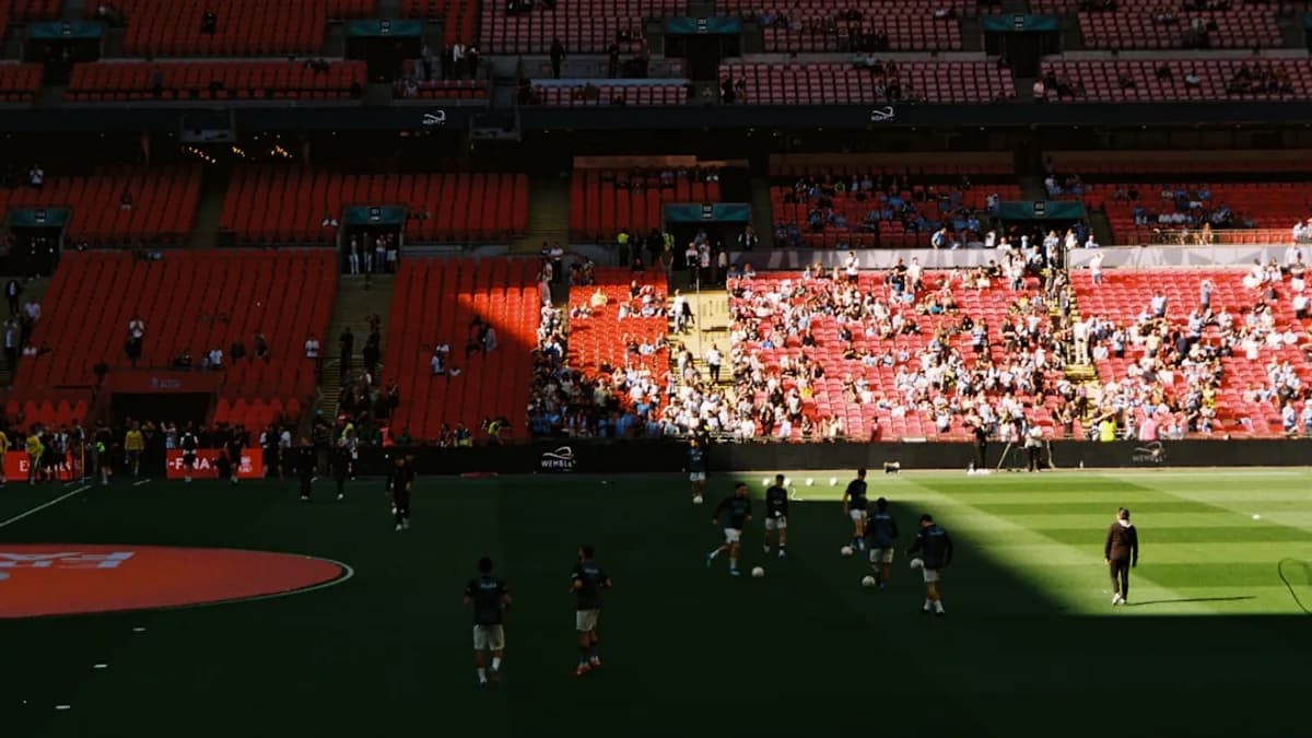 People in a stadium watching a sports game