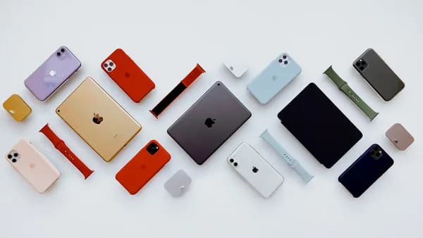 a group of different colored cell phones sitting next to each other