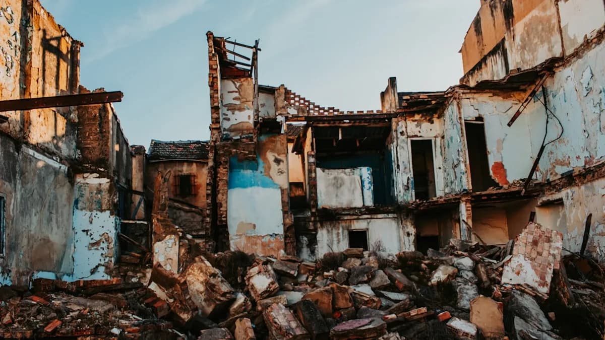 a destroyed building with debris all over it