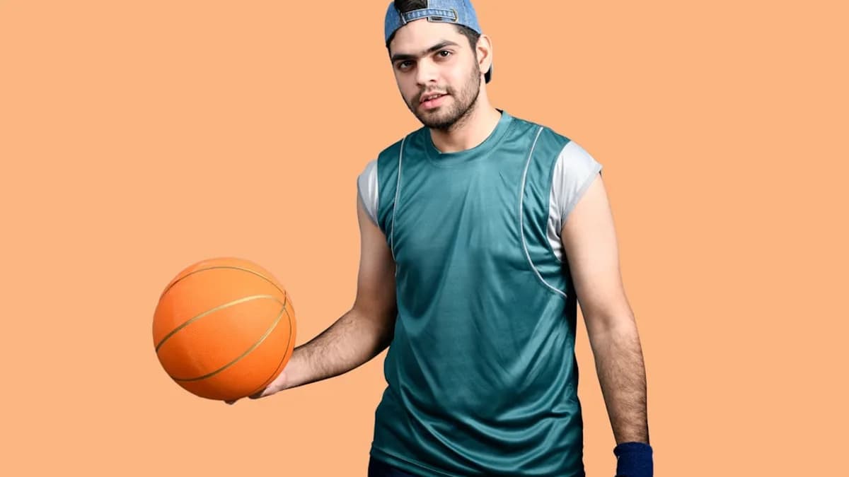a man holding a basketball