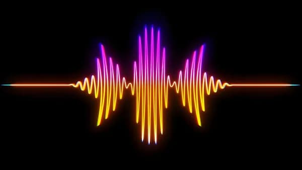 A colorful sound wave on a black background