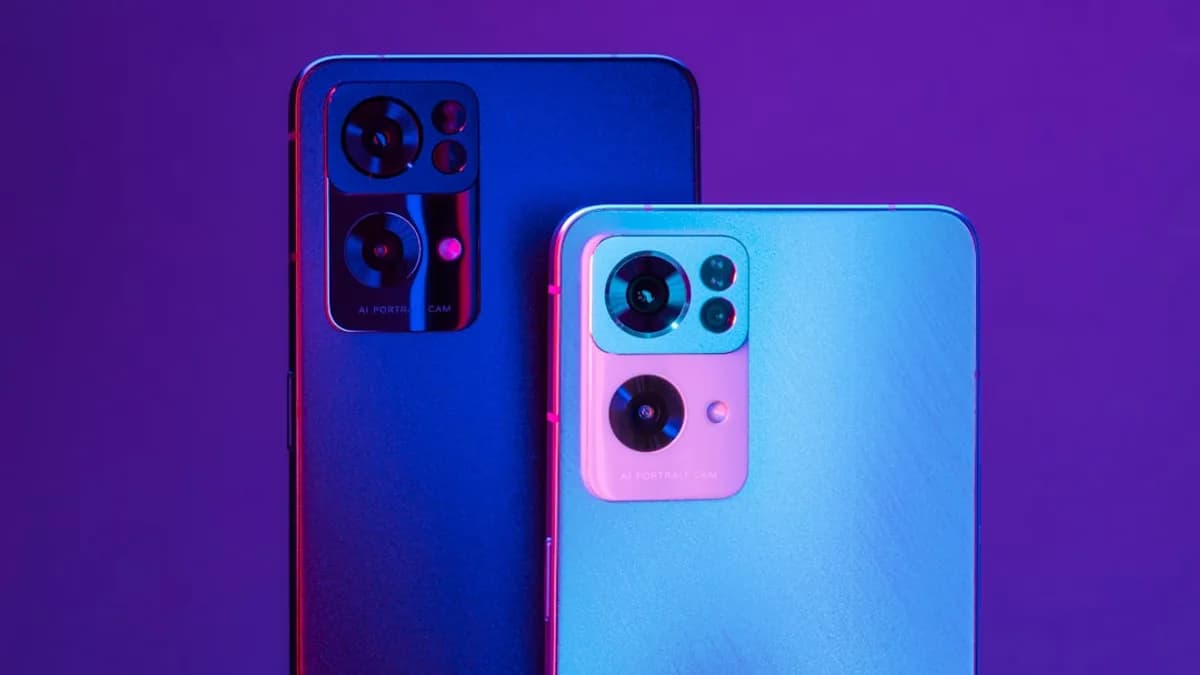 a close up of two cell phones near one another