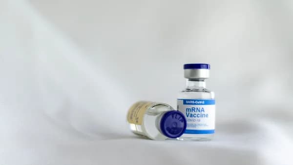 white and blue labeled bottle
