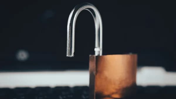 a padlock on top of a laptop computer