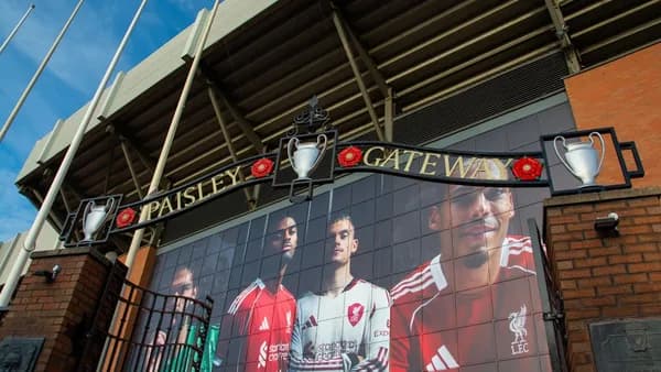 Paisley gateway entrance with football players mural