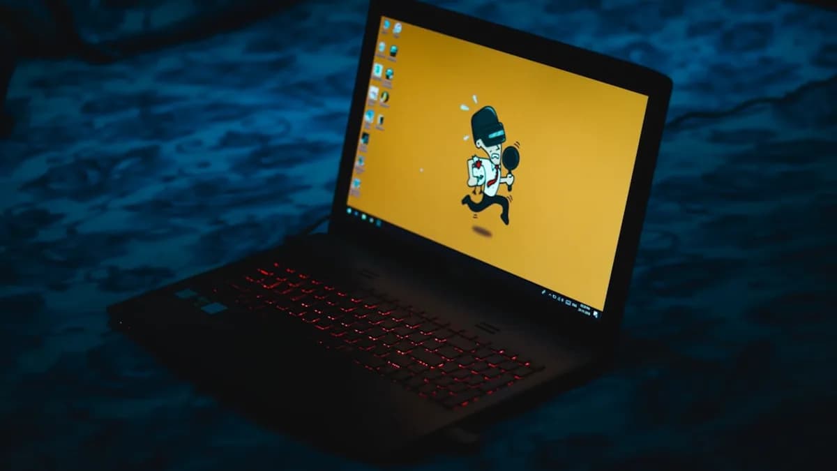 powered-on black laptop computer displaying home screen
