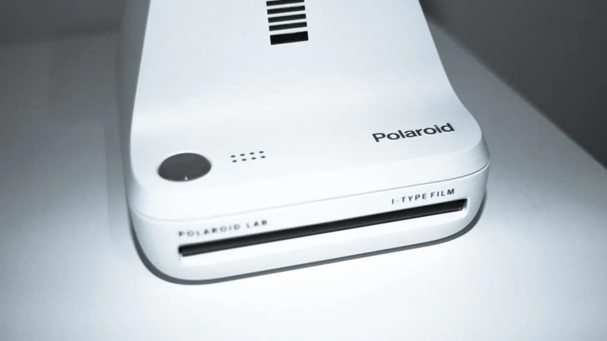 a white electronic device sitting on top of a table