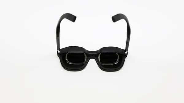 Black 3D glasses on a white background