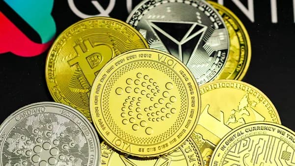 a pile of bitcoins sitting on top of a table