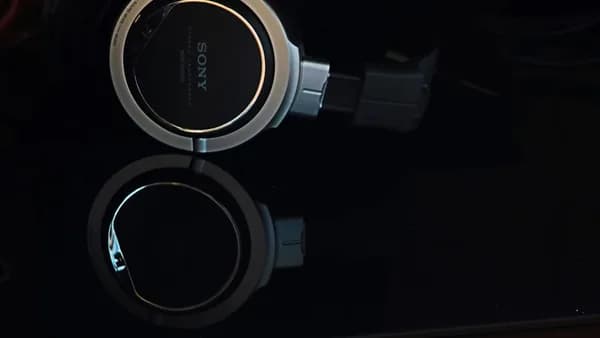 a pair of headphones sitting on top of a table
