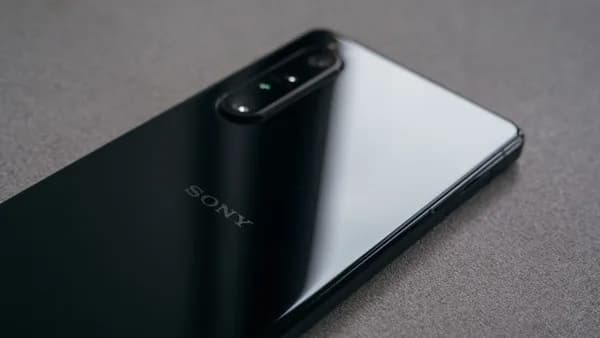 a close up of the back of a black sony phone