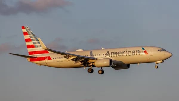 An american airlines plane flying in the sky