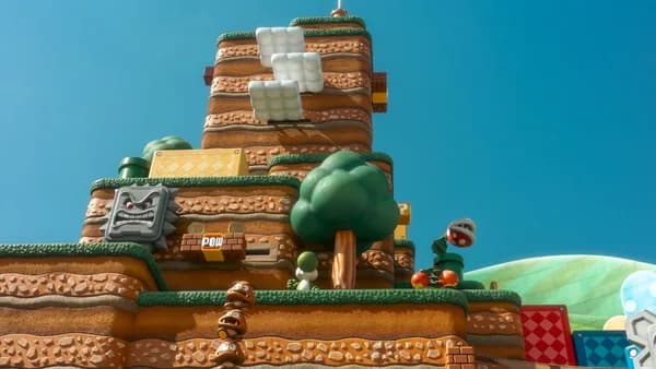 A colorful super mario themed castle with characters