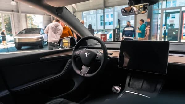 A view of the inside of a car from the driver's seat