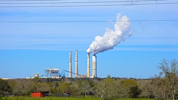 white smoke coming out from factory