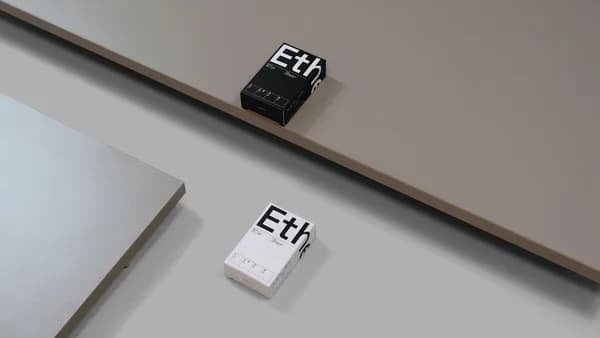 a couple of black and white stamps sitting on top of a table