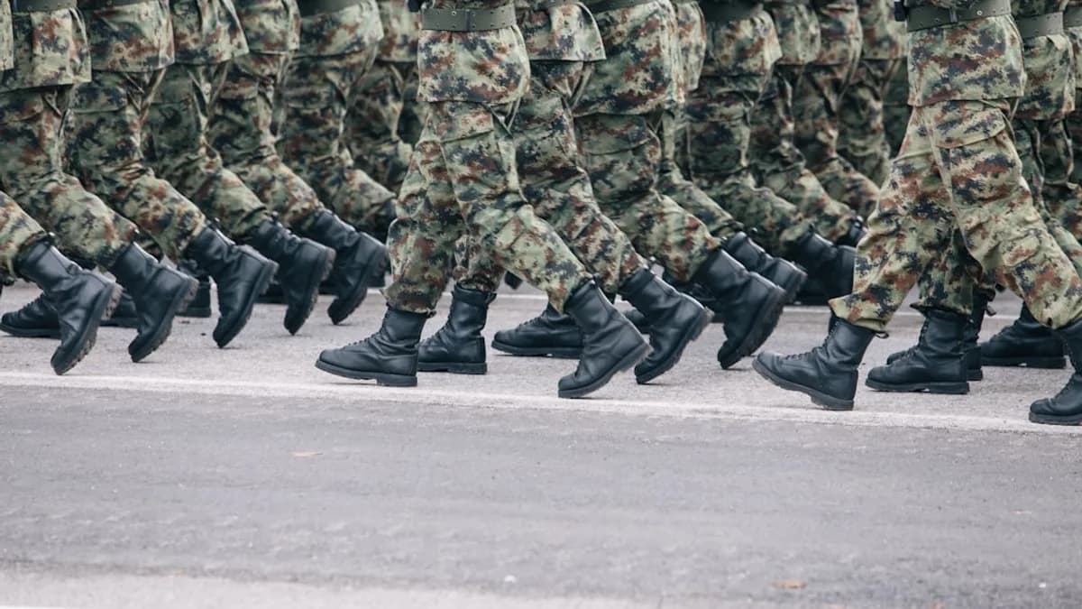 men in green and brown camouflage uniform