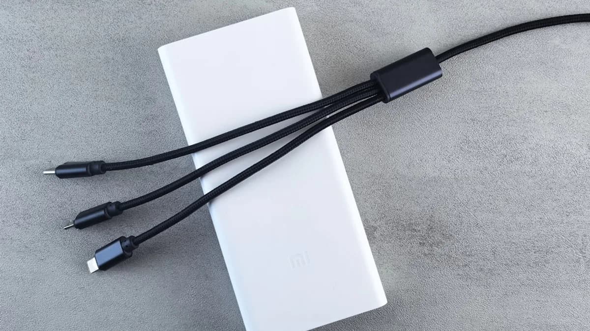 White power bank with three charging cables