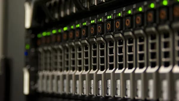 Server rack with blinking green lights