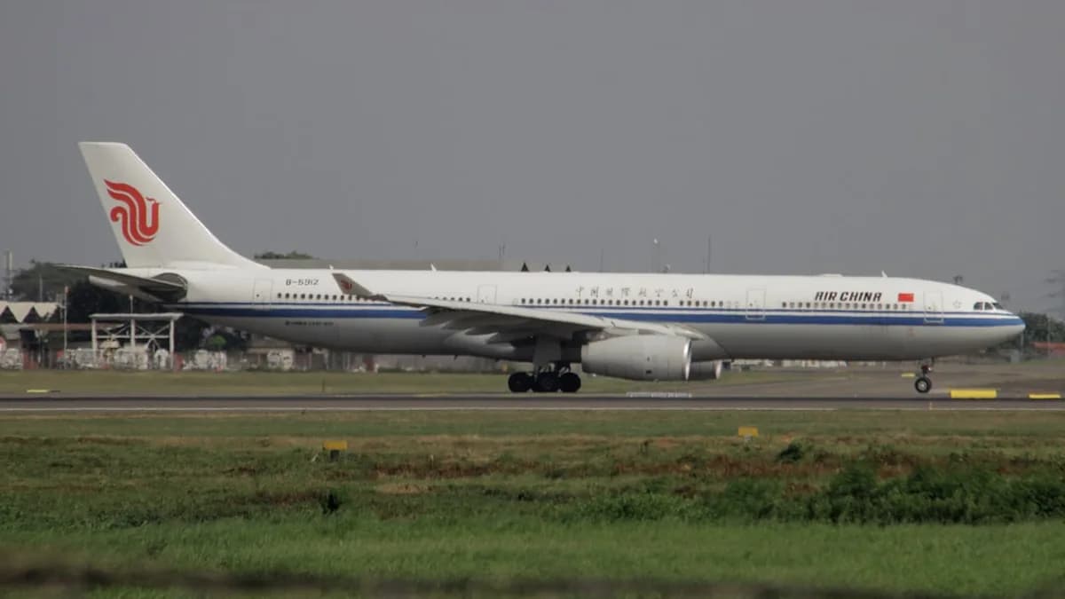 a large jetliner sitting on top of an airport runway