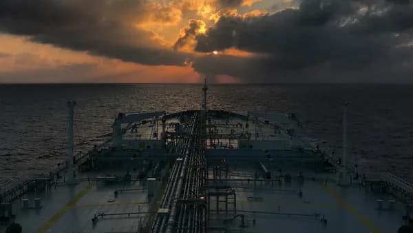 grey and brown ship during golden hour