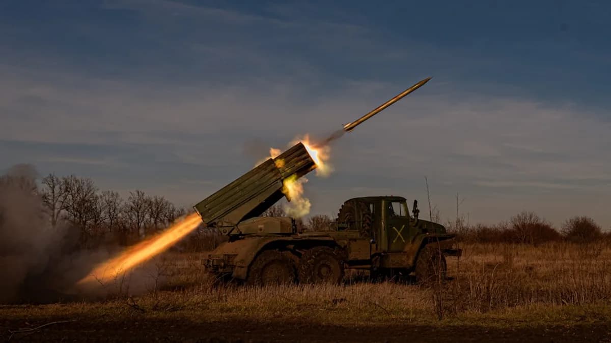 a military vehicle with a missile in the air