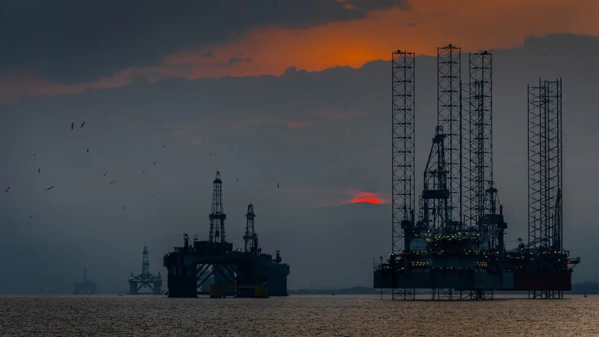a group of oil rigs in the ocean