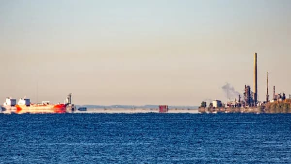 Boats and industrial structures on the water