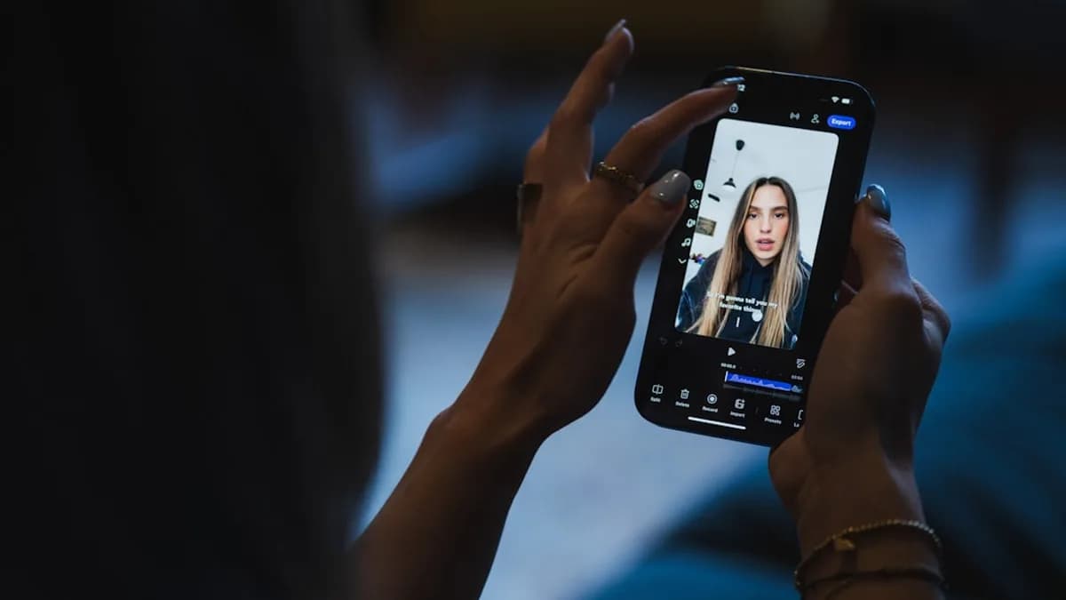 Person watching video on smartphone screen of smartphone