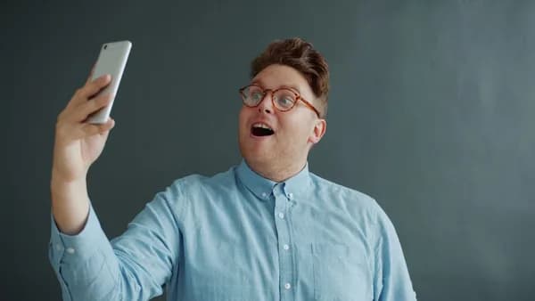 Man taking a selfie with a smartphone