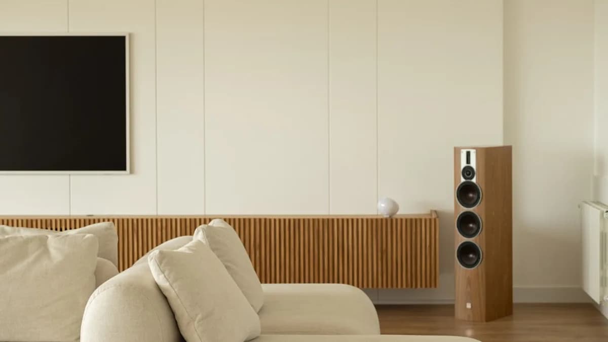 Modern living room with sectional sofa and speaker