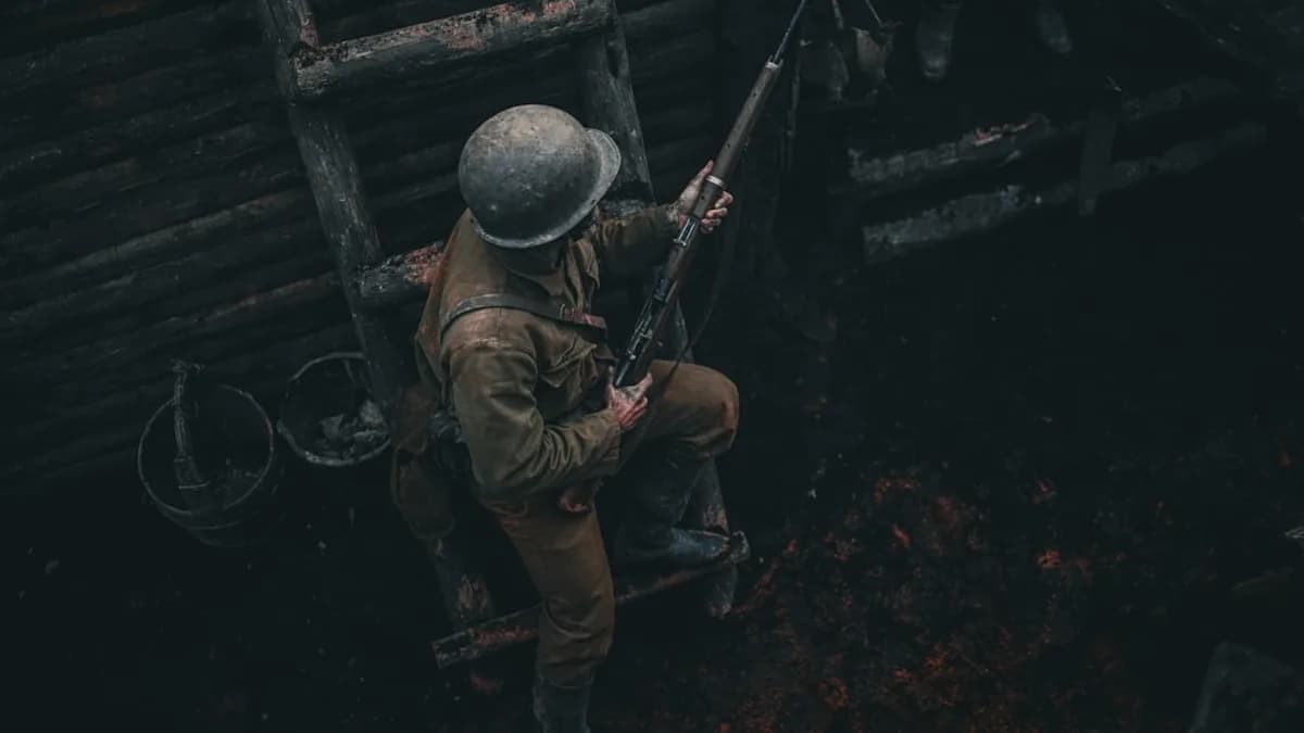 Soldier climbing ladder in dark trench