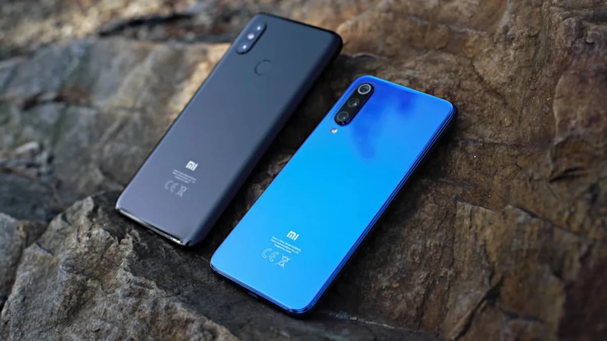 blue and black Xiaomi Redmi android smartphones