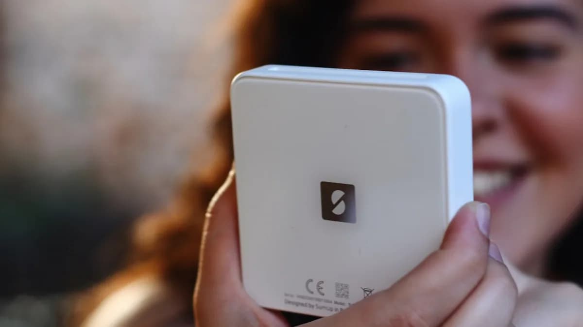 a close up of a person holding a cell phone