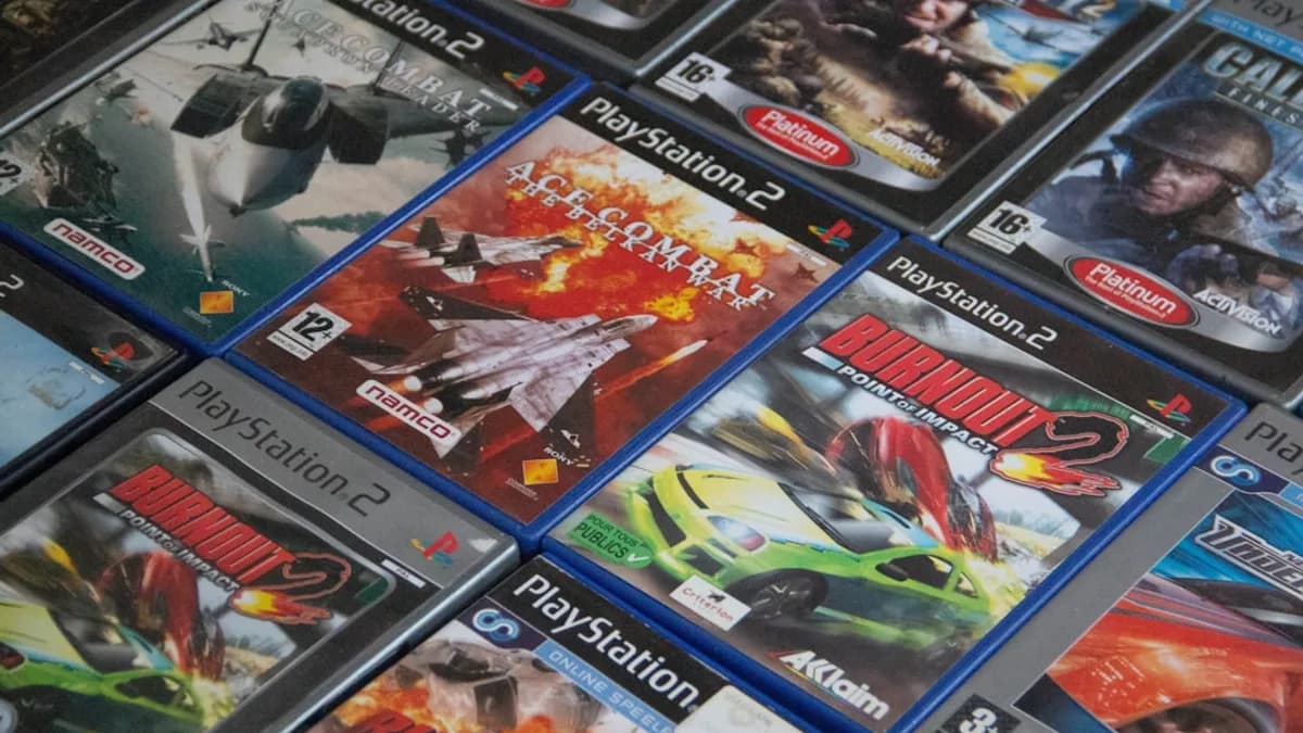 a pile of video games sitting on top of a table