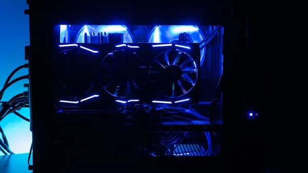 black computer tower inside dark room
