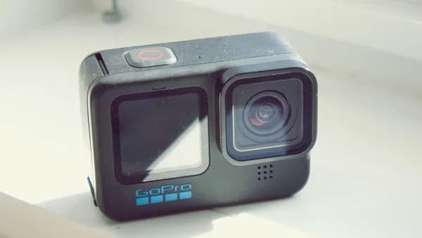 a camera sitting on top of a white table