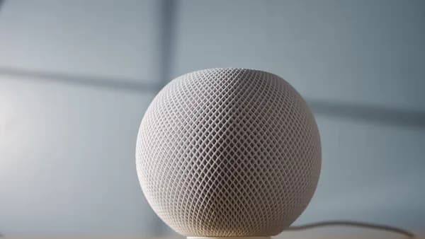 round gray ball on brown wooden table