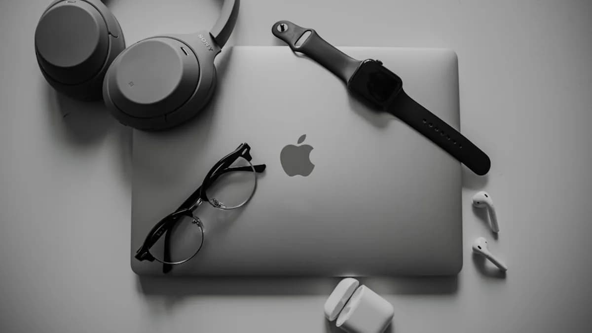 a black and white photo of a microphone and headphones