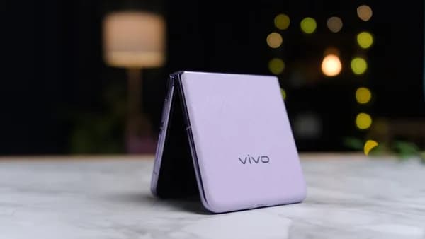 a close up of a cell phone on a table