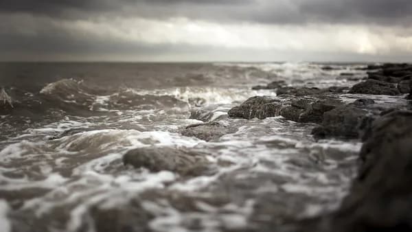 waves crashing against rocks