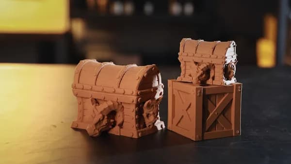 A close up of two pieces of clay on a table
