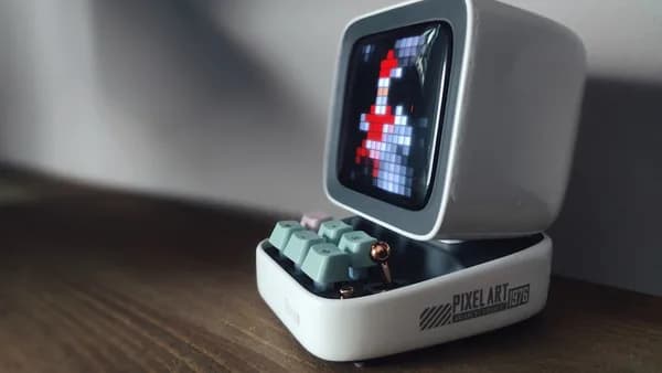 an old computer with a game on the screen
