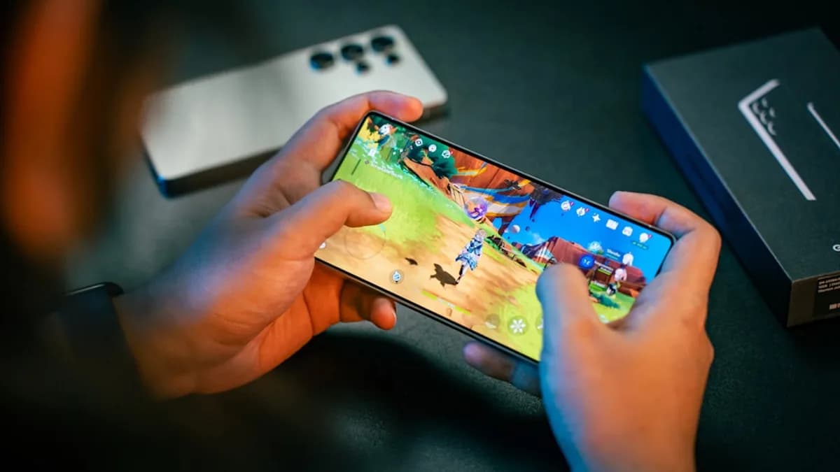 A person is playing a game on their phone
