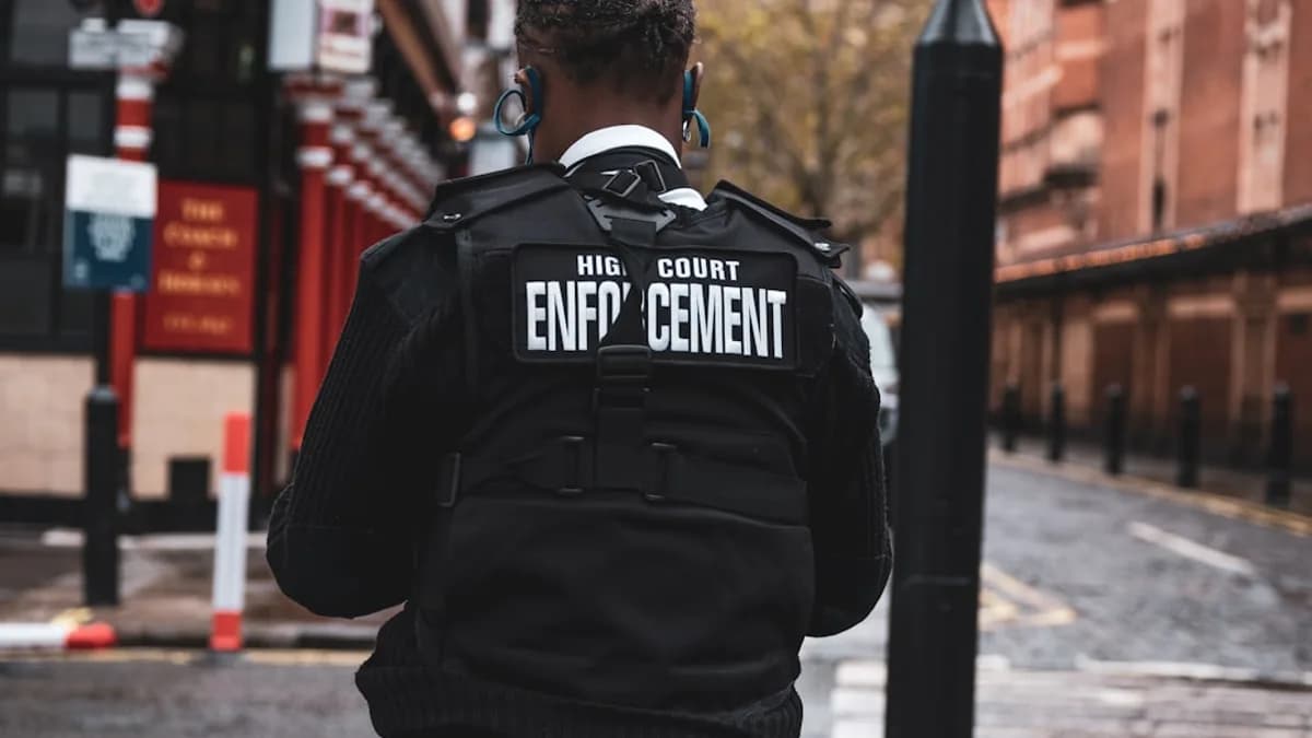 man in black and white adidas jacket wearing black and white headphones